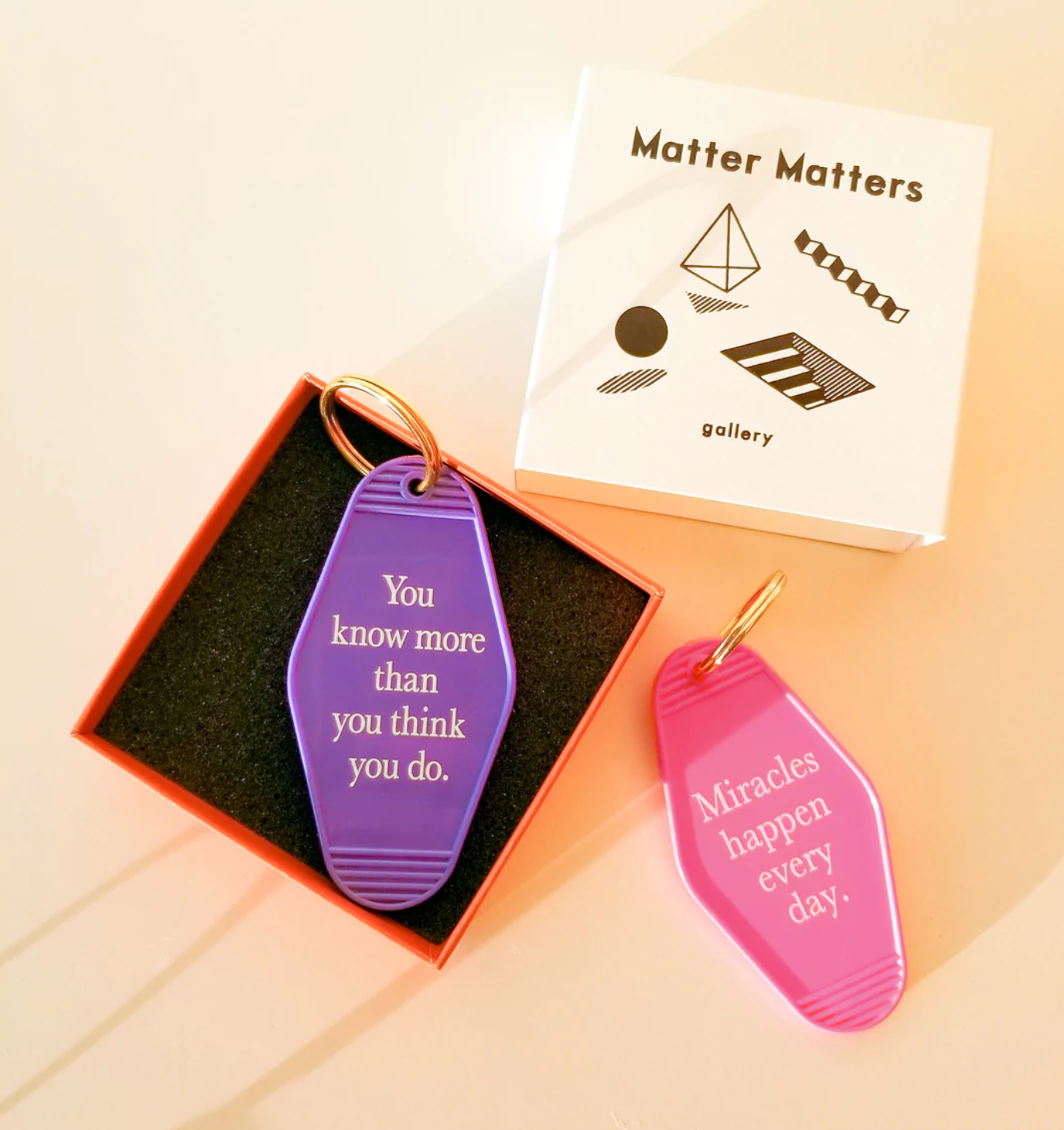 Matter Matters Keyring • Pink • Miracles happen everyday.